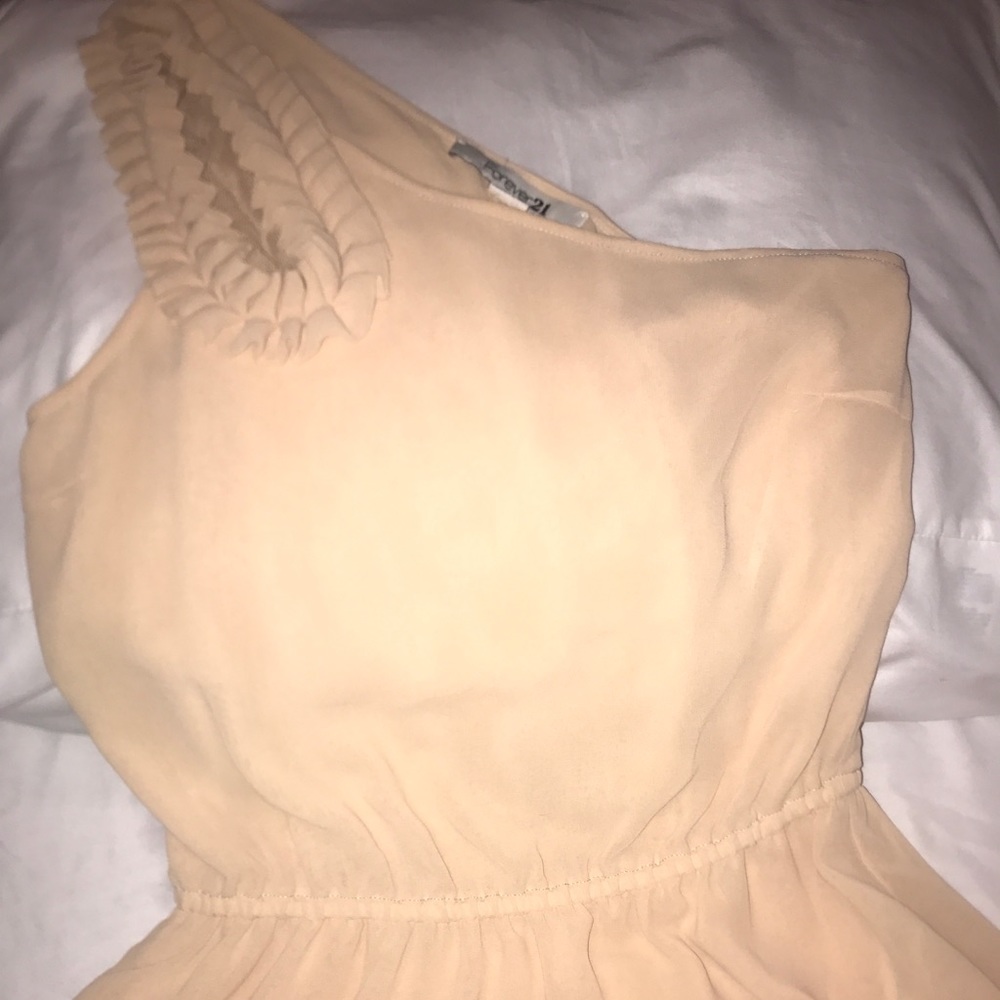 Shoulder crop cream silk top.